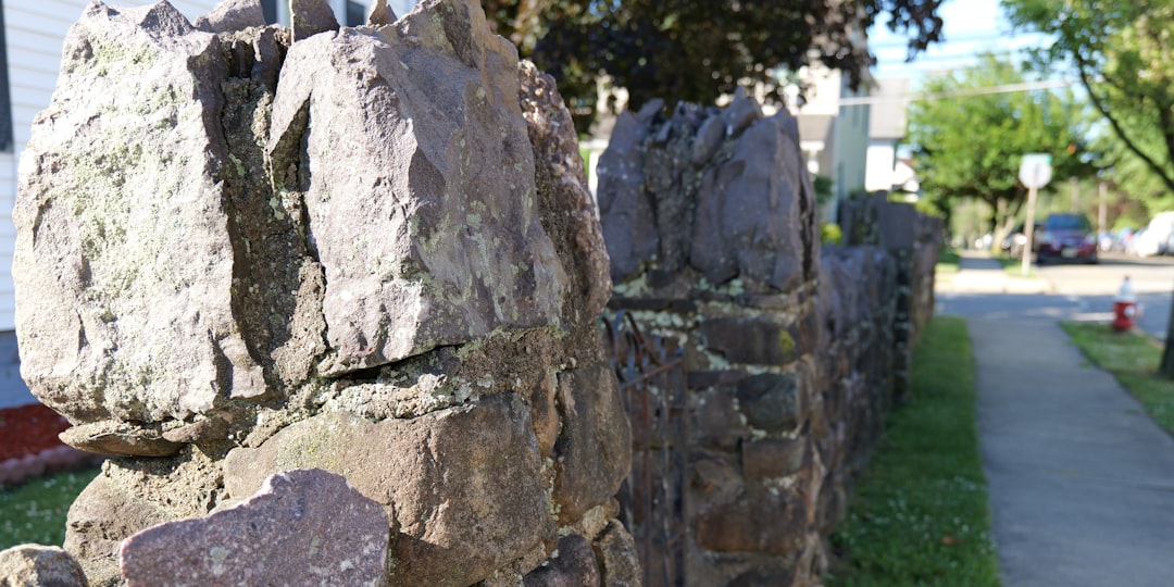 The Price of Perfection: Unveiling Stone Wall Fence Costs
